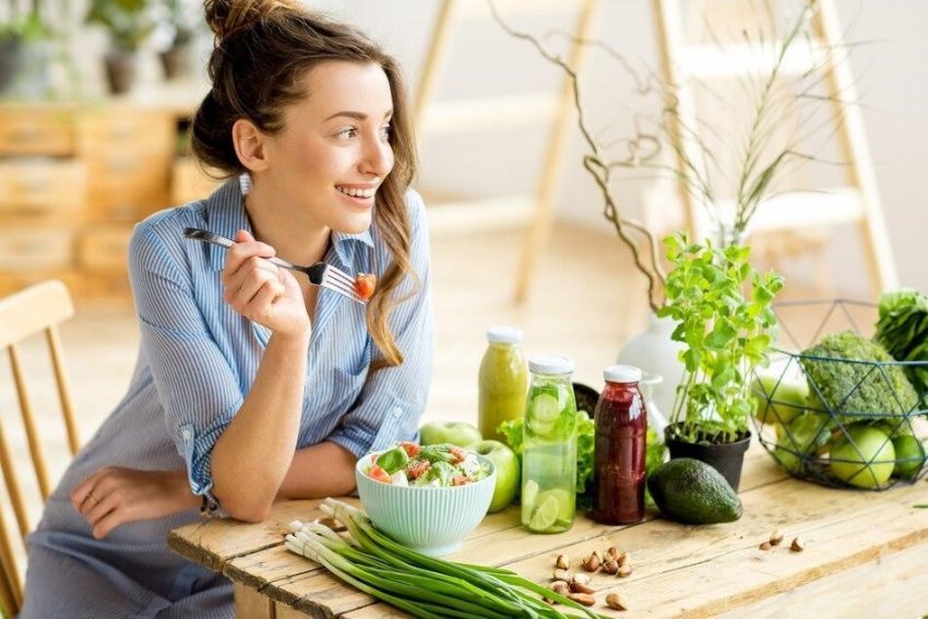 A woman dining on a healthy meal with probiotic infused foods